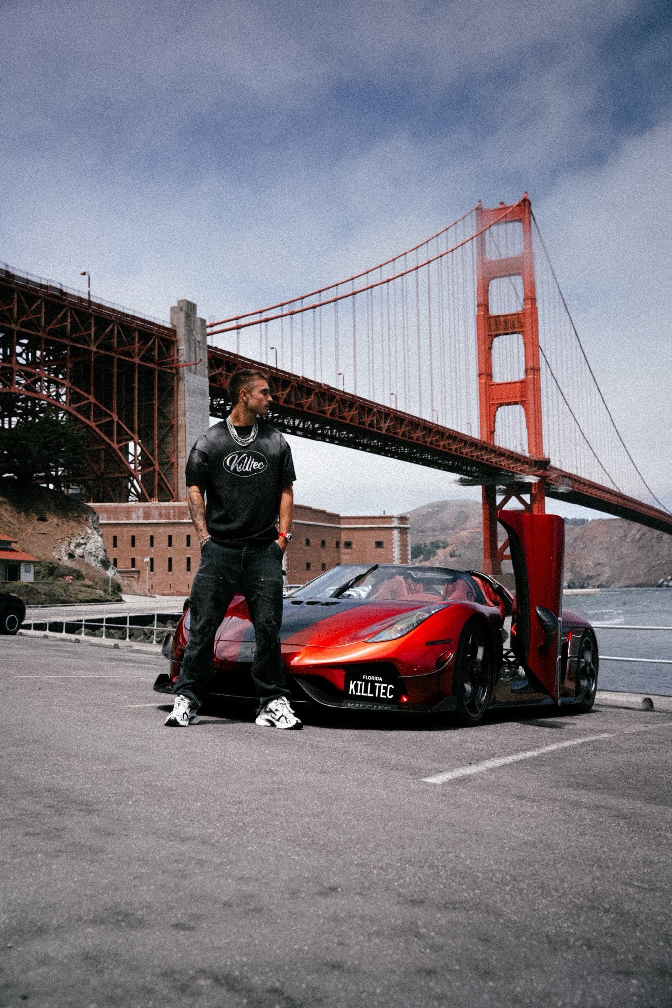 TJR at the Golden Gate Bridge with red supercar