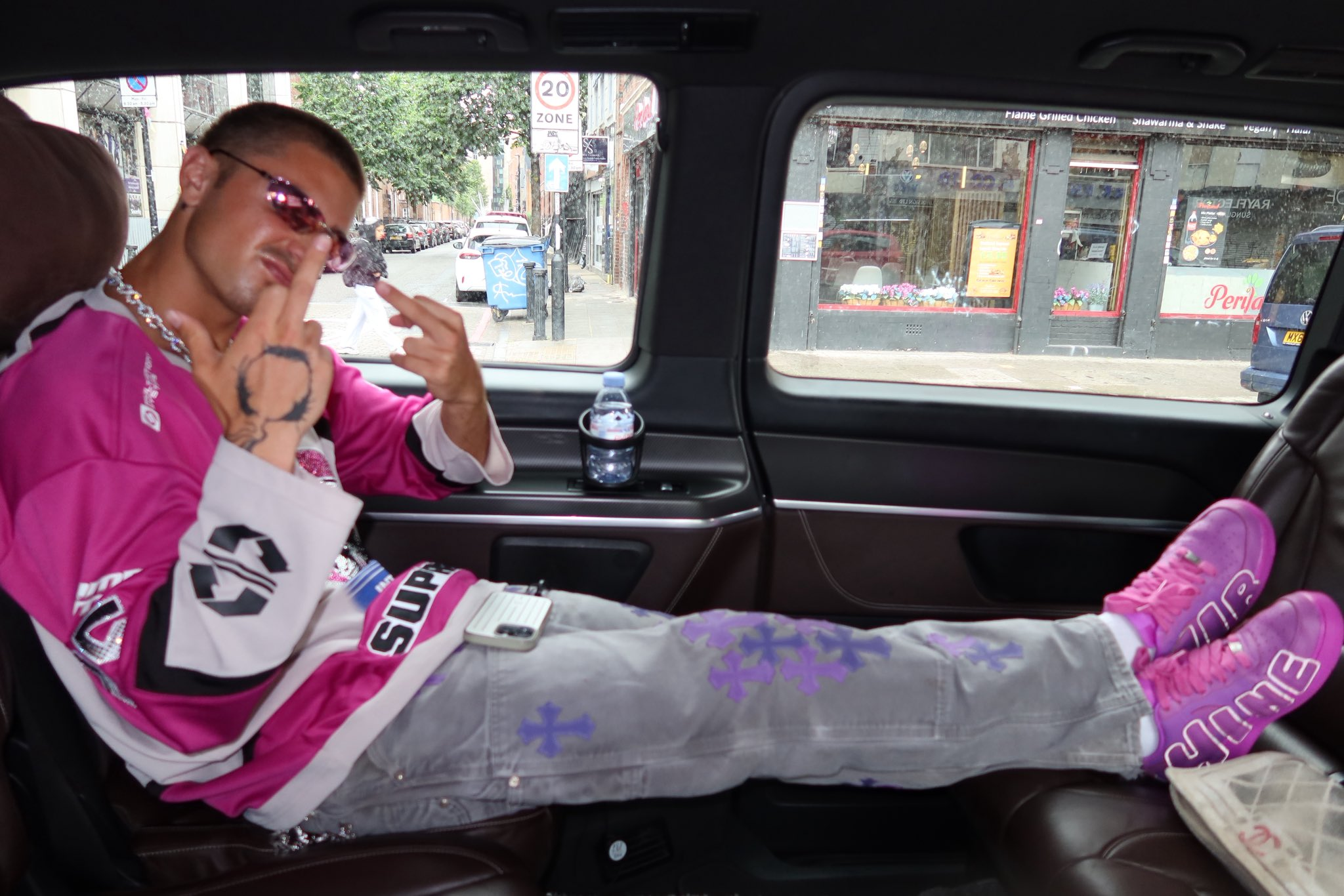 TJR in pink motocross fit in luxury vehicle